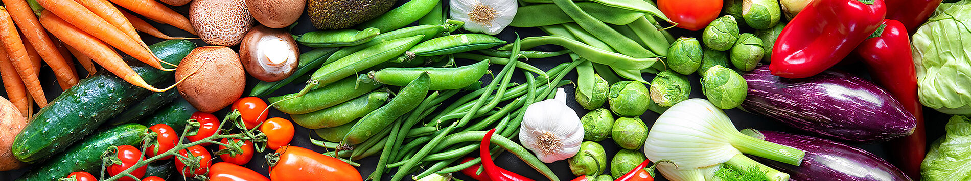 Vegetables: carrots, cucumbers, beans, peppers, Brussels sprouts, and eggplants.